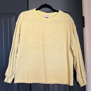 Pale yellow sweatshirt